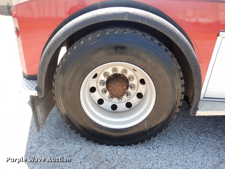 image for item KF9690 2005 GMC C7500  Crew Cab flatbed truck