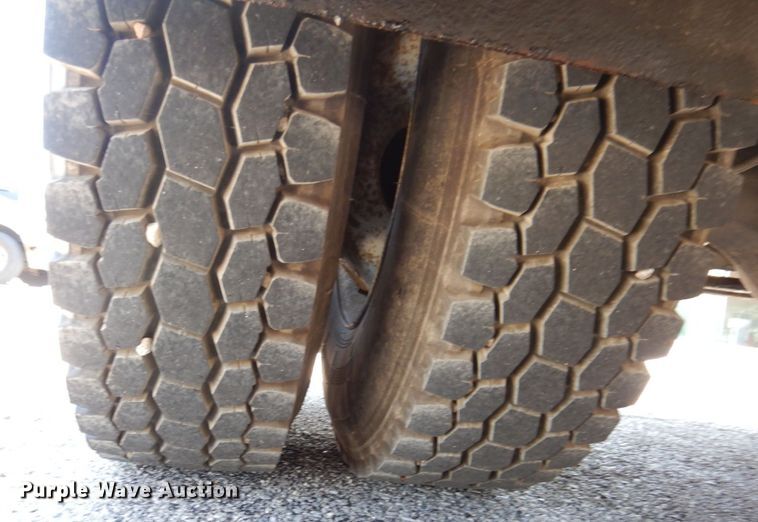 image for item KF9690 2005 GMC C7500  Crew Cab flatbed truck