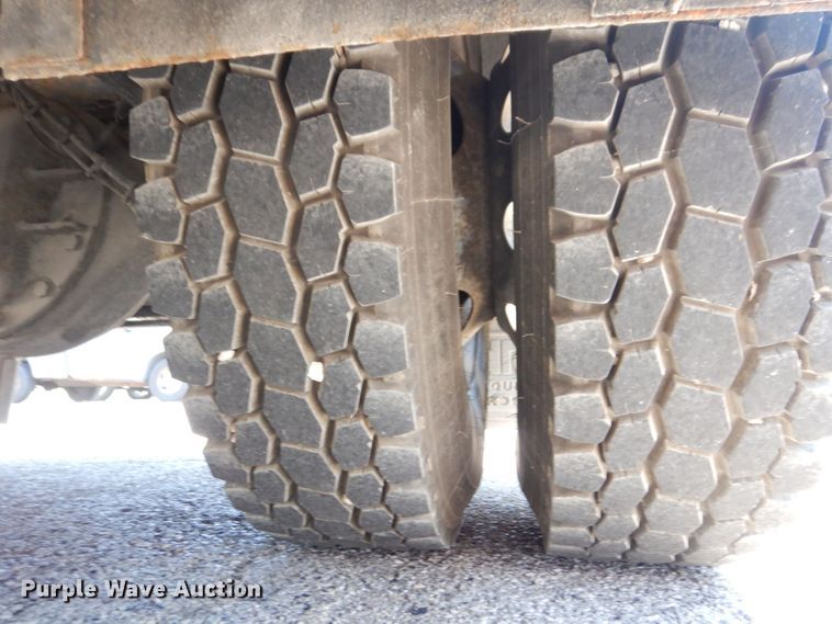 image for item KF9690 2005 GMC C7500  Crew Cab flatbed truck