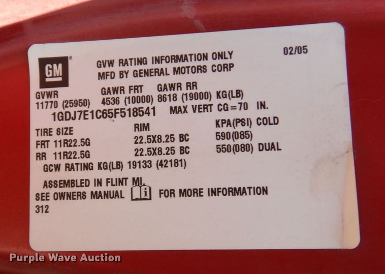 image for item KF9690 2005 GMC C7500  Crew Cab flatbed truck