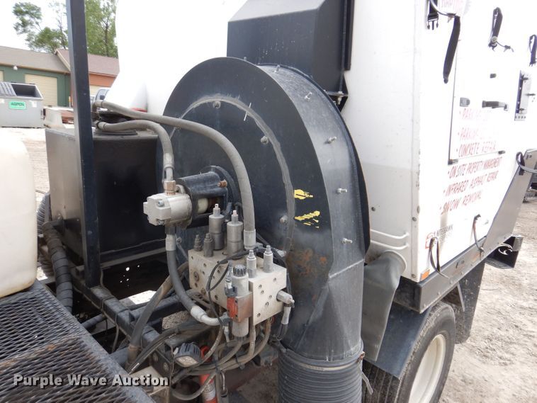 image for item KN9814 2016 Isuzu NPR  street sweeper truck