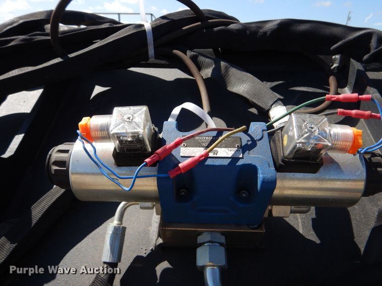 image for item KV9964 Wolverine  skid steer concrete mixer