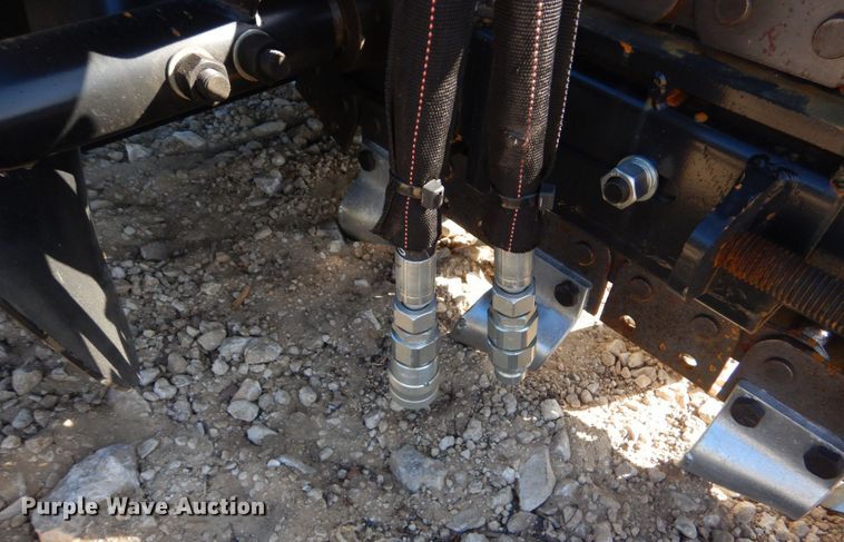 image for item KV9979 Wolverine  skid steer trencher