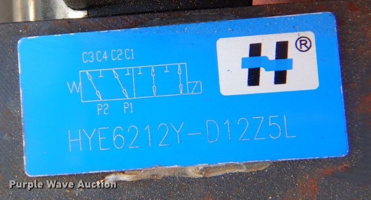 image for item KV9982 Wolverine  skid steer concrete mixer