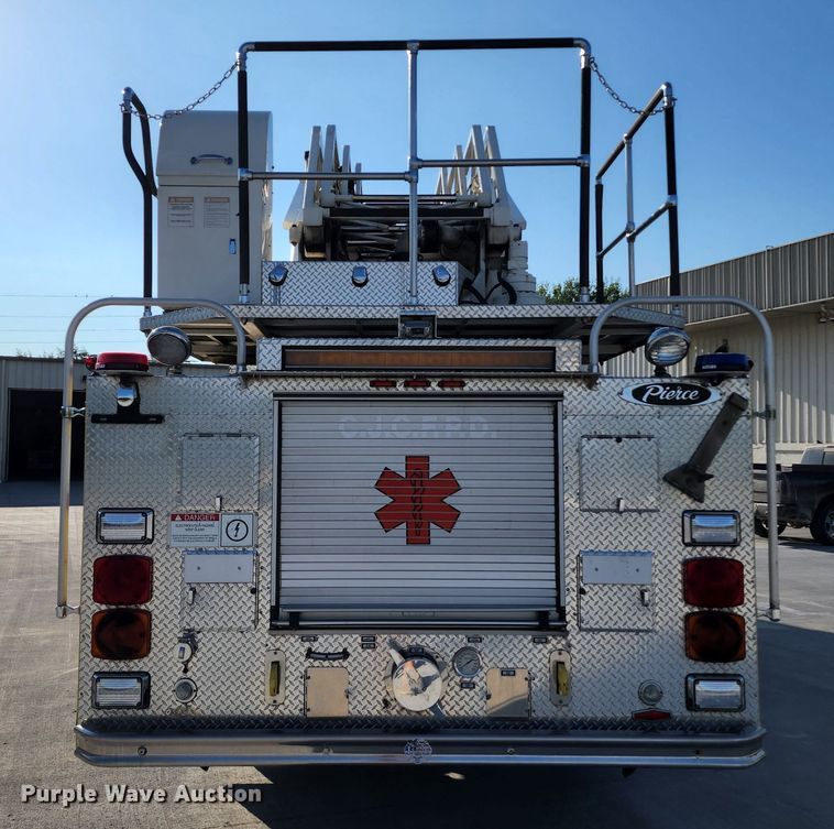 image for item JA9942 1999 Pierce Tilt Cab  ladder fire truck