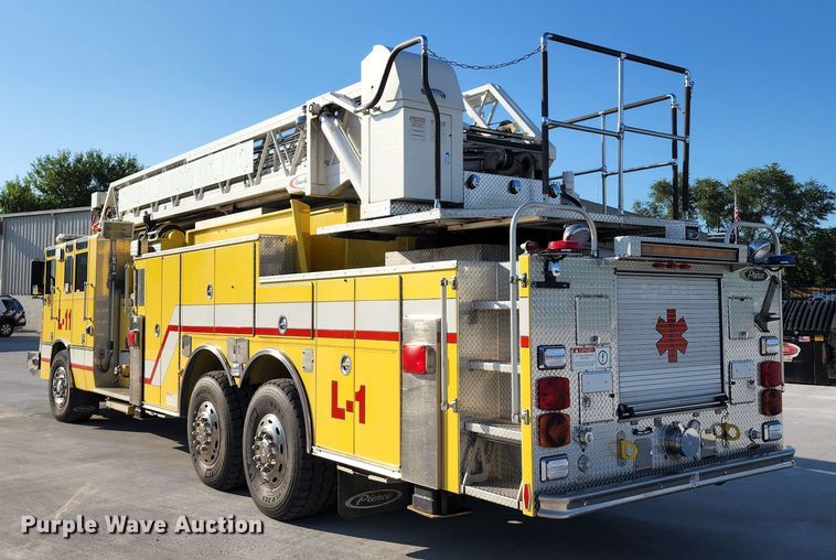 image for item JA9942 1999 Pierce Tilt Cab  ladder fire truck