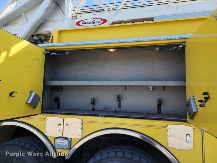 image for item JA9942 1999 Pierce Tilt Cab  ladder fire truck