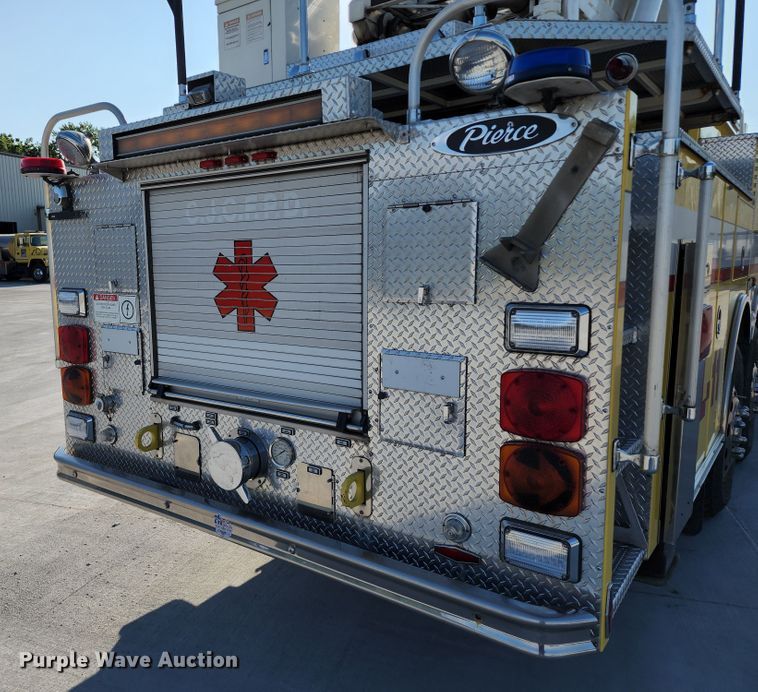 image for item JA9942 1999 Pierce Tilt Cab  ladder fire truck