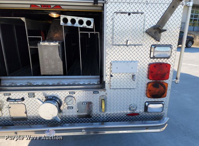 image for item JA9942 1999 Pierce Tilt Cab  ladder fire truck