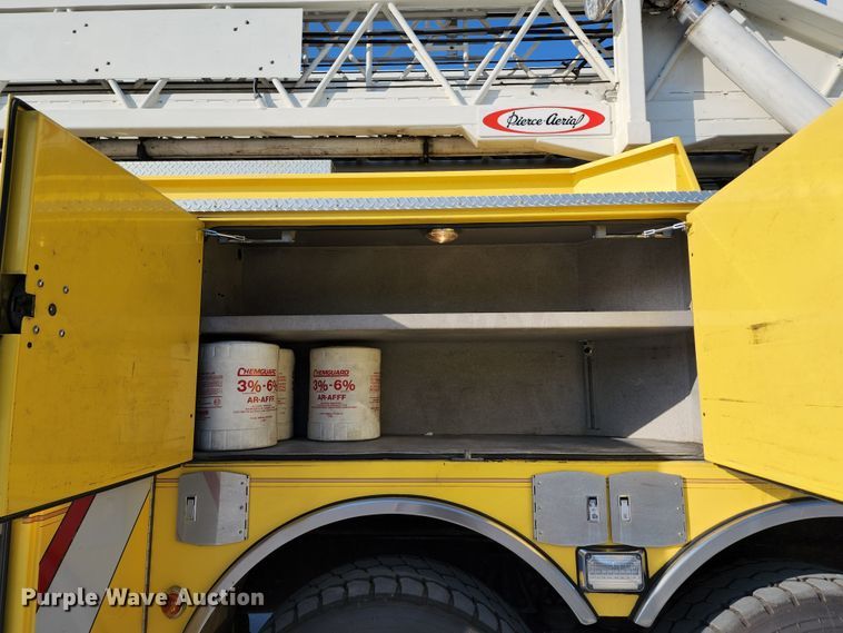 image for item JA9942 1999 Pierce Tilt Cab  ladder fire truck