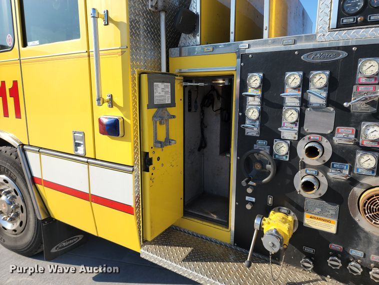 image for item JA9942 1999 Pierce Tilt Cab  ladder fire truck