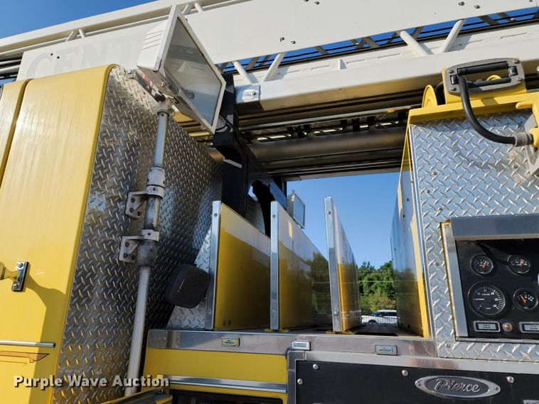 image for item JA9942 1999 Pierce Tilt Cab  ladder fire truck