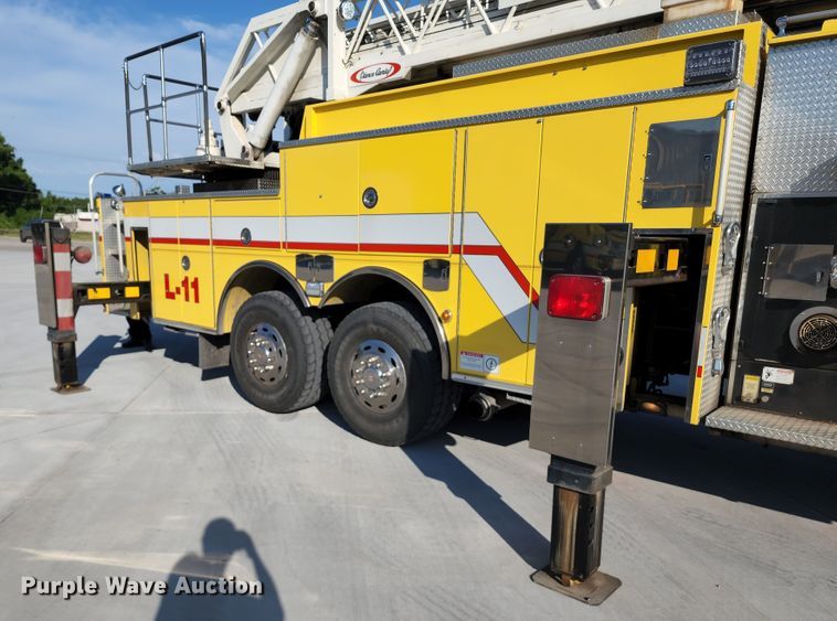 image for item JA9942 1999 Pierce Tilt Cab  ladder fire truck