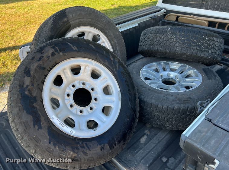 image for item JM9227 (4) Goodyear LT265/70R18 tires and wheels