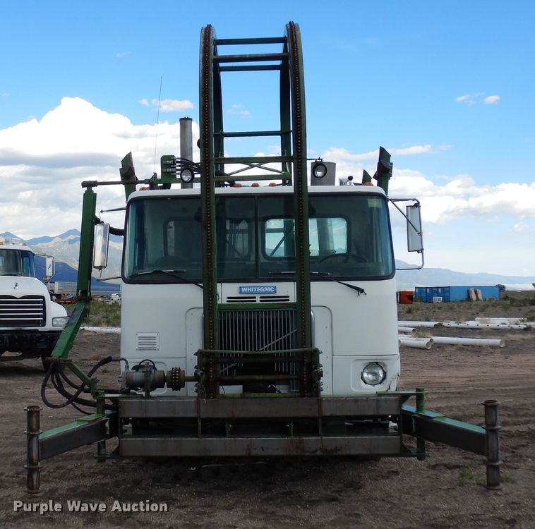 image for item DR1260 White GMC  bale stacker