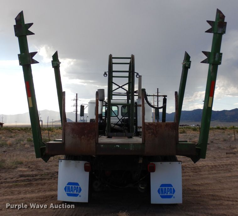 image for item DR1260 White GMC  bale stacker