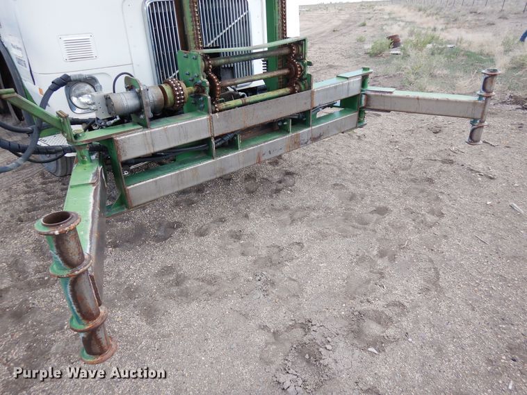 image for item DR1260 White GMC  bale stacker