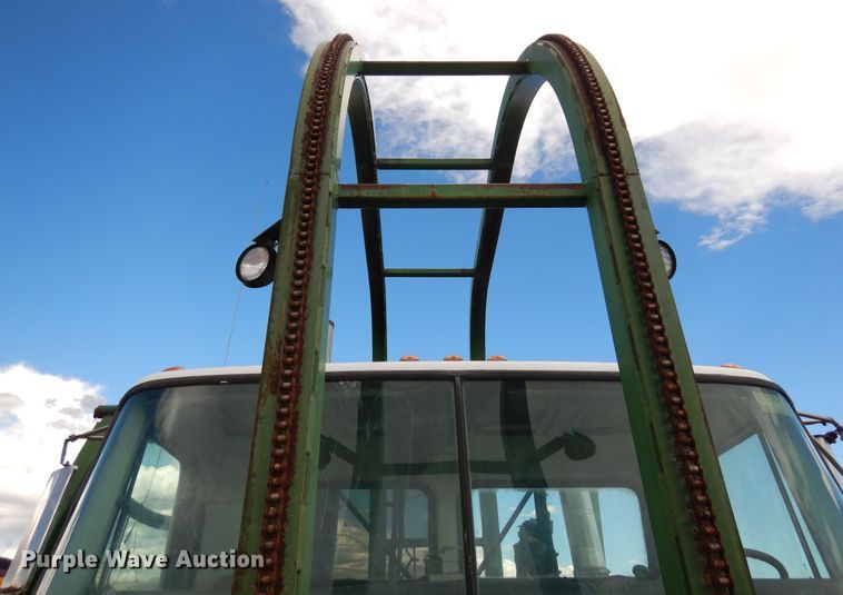 image for item DR1260 White GMC  bale stacker