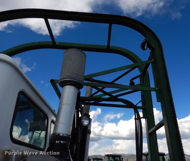 image for item DR1260 White GMC  bale stacker