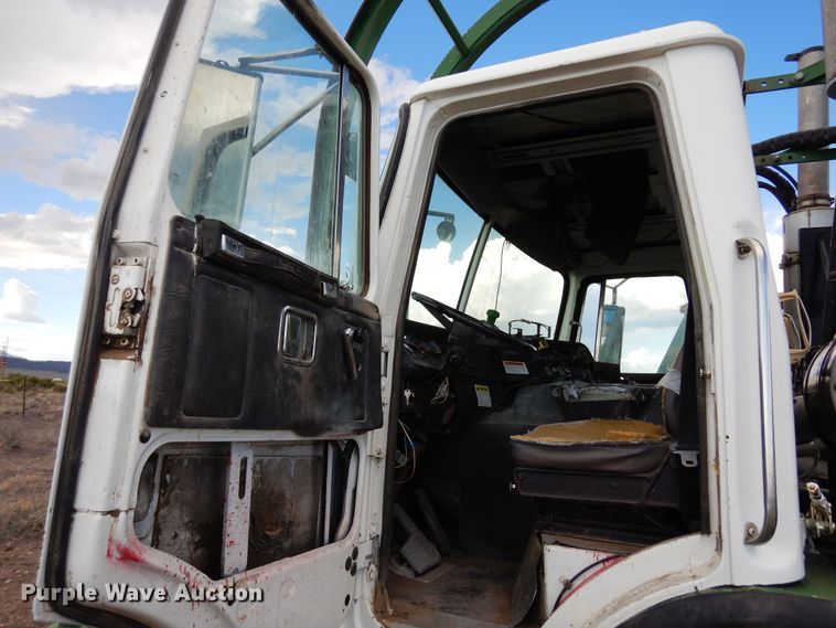 image for item DR1260 White GMC  bale stacker