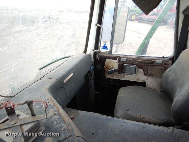 image for item DR1260 White GMC  bale stacker