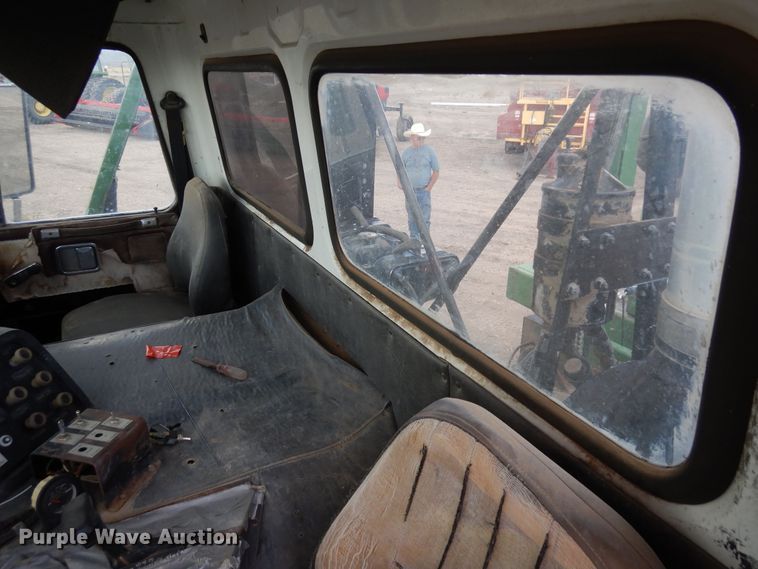 image for item DR1260 White GMC  bale stacker