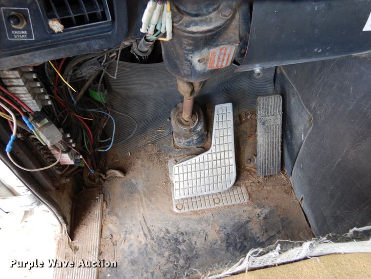 image for item DR1260 White GMC  bale stacker