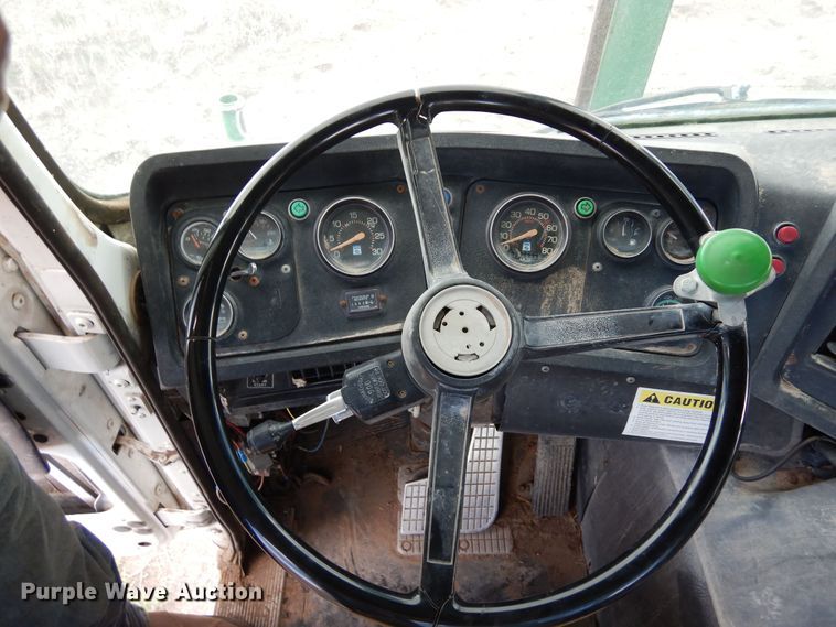 image for item DR1260 White GMC  bale stacker