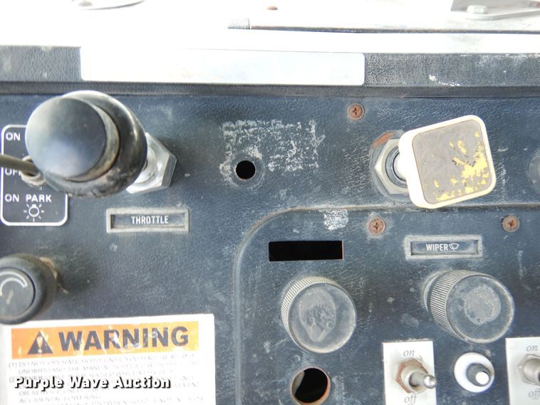 image for item DR1260 White GMC  bale stacker