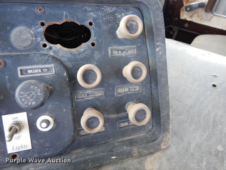 image for item DR1260 White GMC  bale stacker