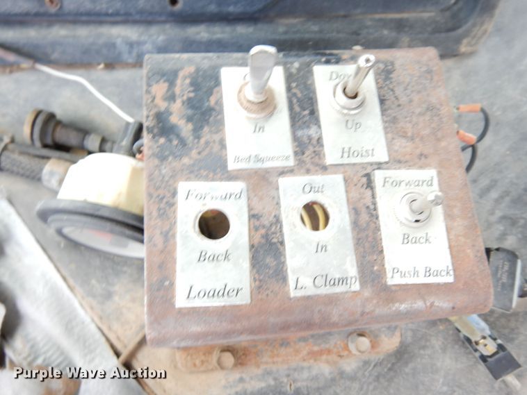 image for item DR1260 White GMC  bale stacker