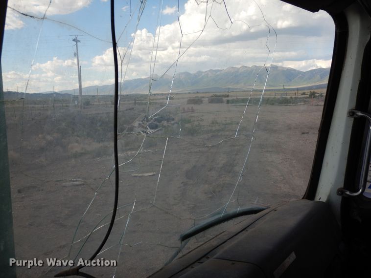 image for item DR1260 White GMC  bale stacker