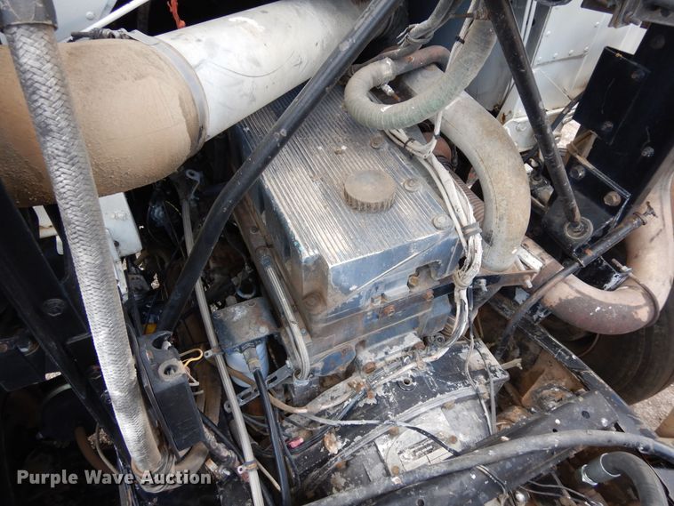 image for item DR1260 White GMC  bale stacker