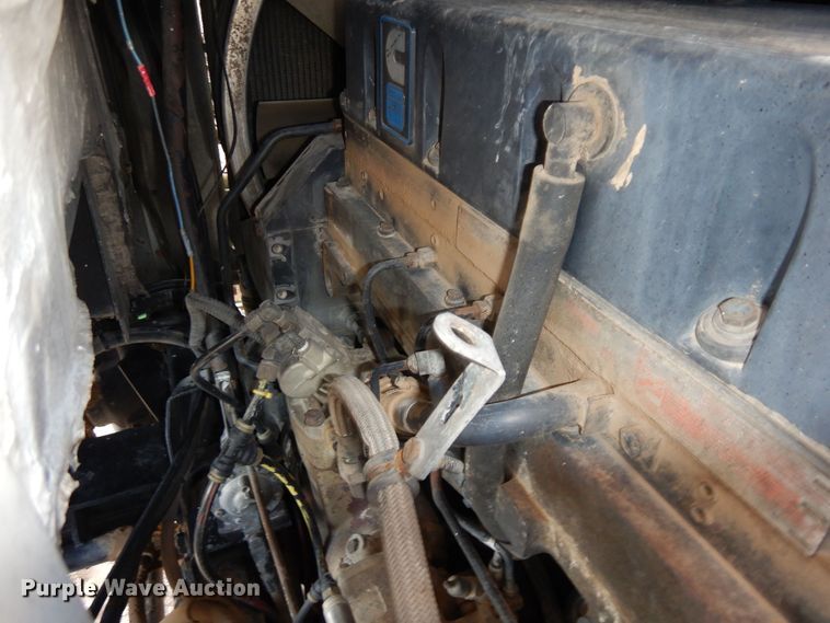 image for item DR1260 White GMC  bale stacker