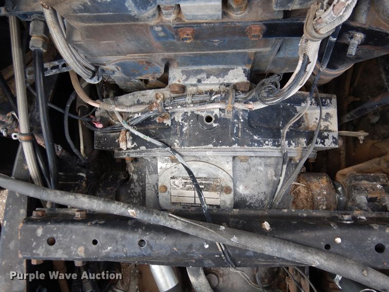 image for item DR1260 White GMC  bale stacker