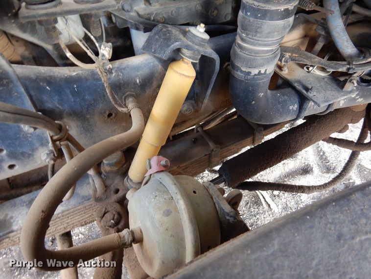 image for item DR1260 White GMC  bale stacker