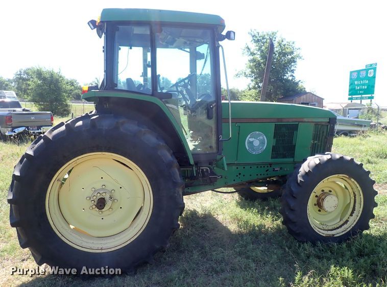 image for item IN9067 2002 John Deere 6605  MFWD tractor