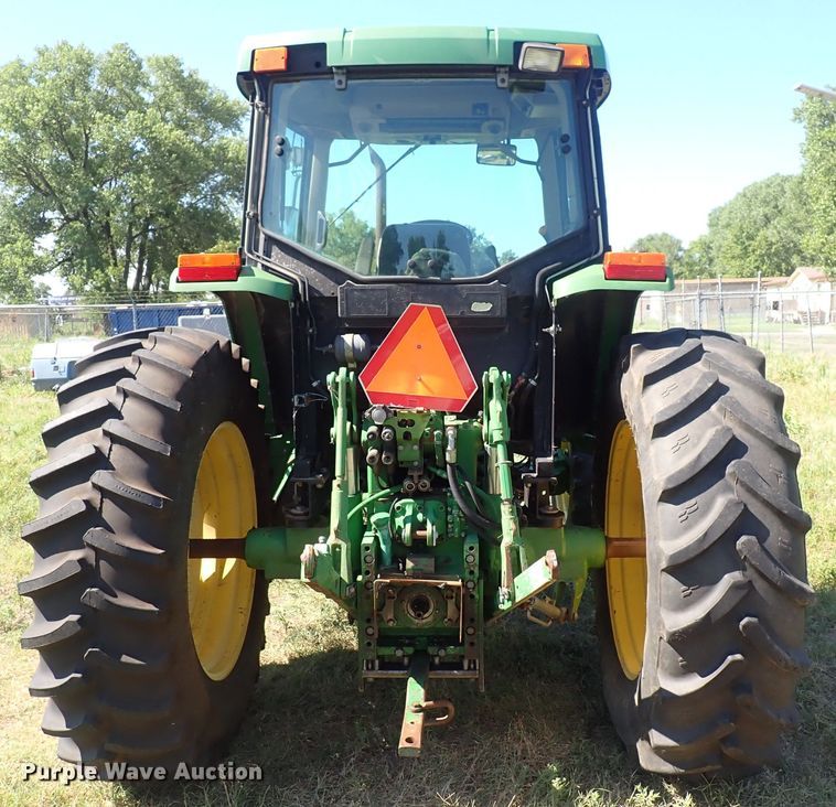 image for item IN9067 2002 John Deere 6605  MFWD tractor