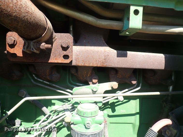 image for item IN9067 2002 John Deere 6605  MFWD tractor