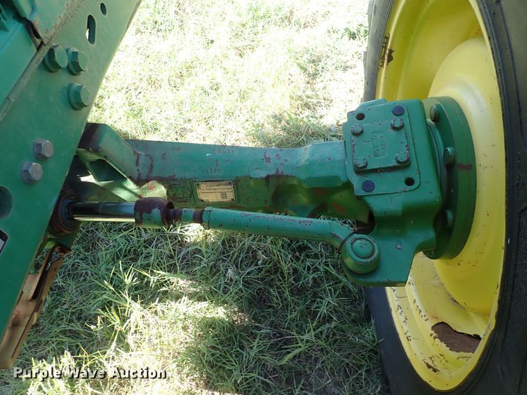 image for item IN9067 2002 John Deere 6605  MFWD tractor