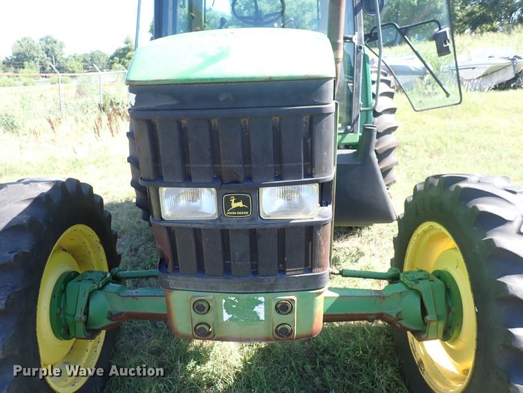 image for item IN9067 2002 John Deere 6605  MFWD tractor