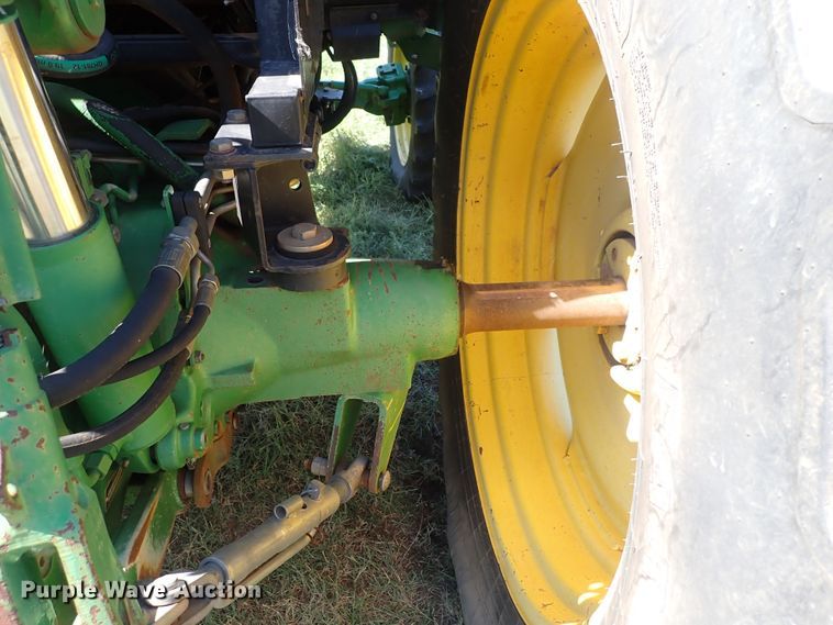 image for item IN9067 2002 John Deere 6605  MFWD tractor