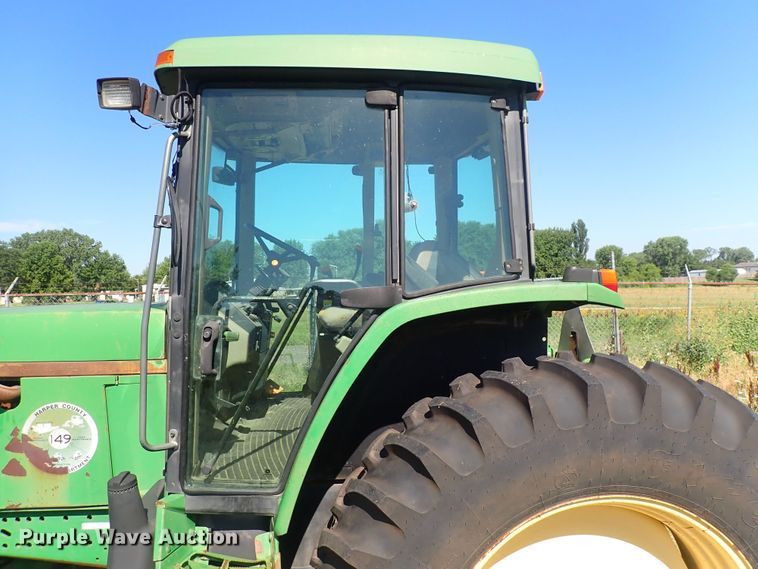 image for item IN9067 2002 John Deere 6605  MFWD tractor