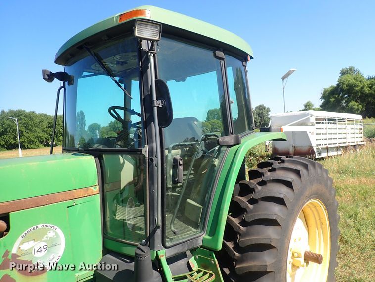 image for item IN9067 2002 John Deere 6605  MFWD tractor