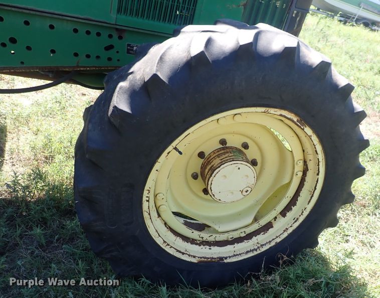 image for item IN9067 2002 John Deere 6605  MFWD tractor