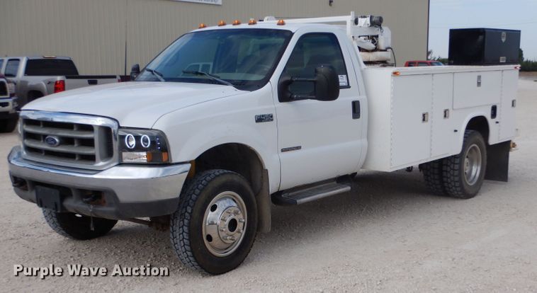 image for item DJ7669 1999 Ford F450 Super Duty XLT  utility / service truck