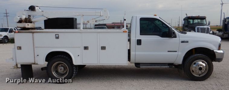 image for item DJ7669 1999 Ford F450 Super Duty XLT  utility / service truck