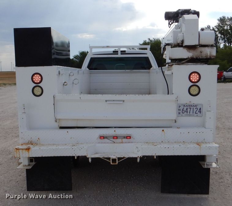 image for item DJ7669 1999 Ford F450 Super Duty XLT  utility / service truck