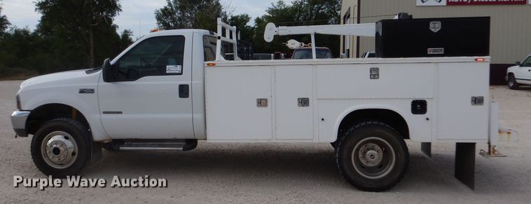 image for item DJ7669 1999 Ford F450 Super Duty XLT  utility / service truck