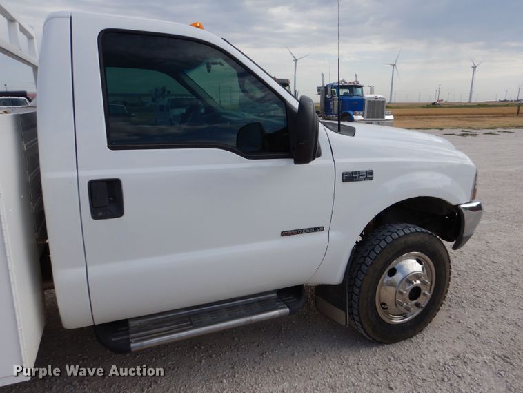 image for item DJ7669 1999 Ford F450 Super Duty XLT  utility / service truck